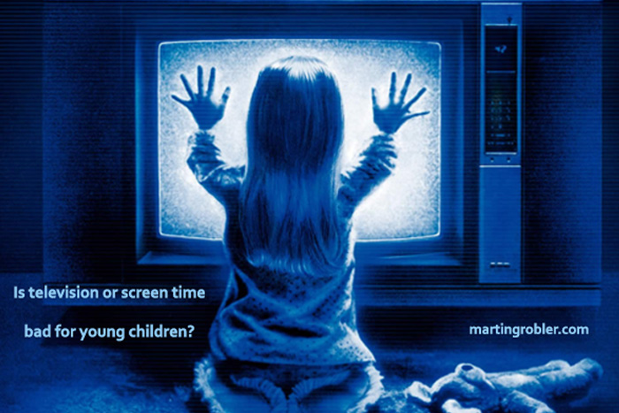 Child holding a screen